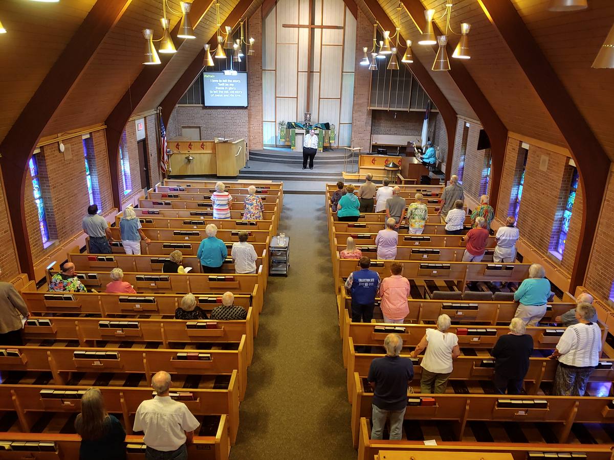 Congregation singing hymns